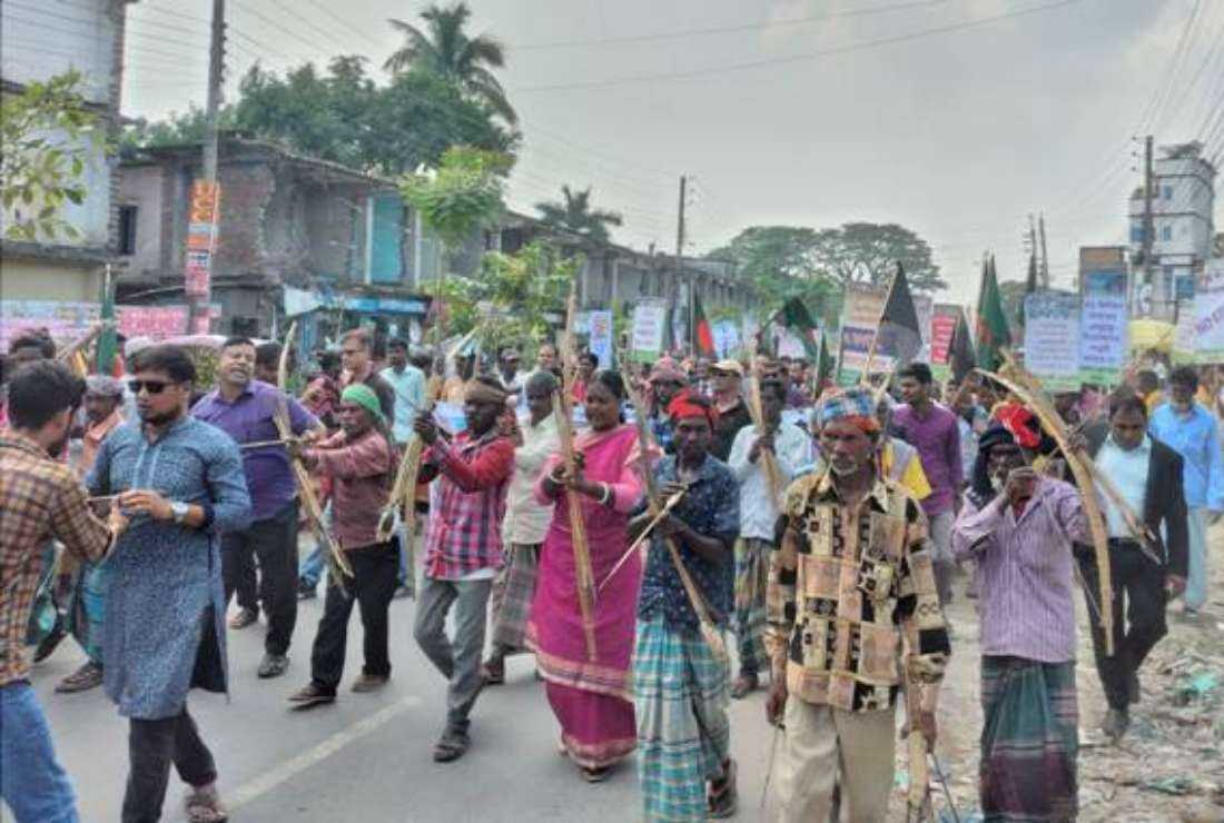 Bangladesh's indigenous Santal people take out a rally to demand justice six years after being attacked and driven out of their ancestral land in Gaibandha district, on Nov. 6