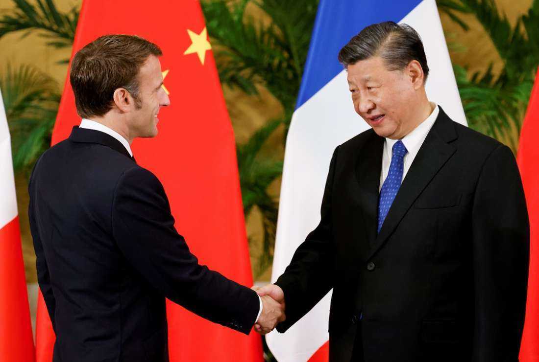 French President Emmanuel Macron (left) meets Chinese President Xi Jinping on the sidelines of the G20 Summit in Bali on Nov 15. Both are heads of largely atheistic societies