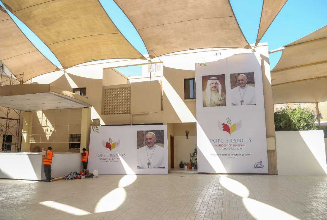 A poster bearing the images of Bahrain's King Hamad bin Isa al-Khalifa (left) and Pope Francis is displayed at the Sacred Heart Church in the capital Manama, on Oct. 7