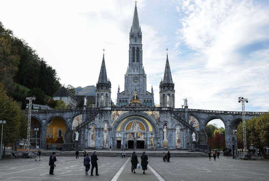 This photograph taken on Nov. 7 shows the Notre-Dame-du-Rosaire Basilica (foreground) and the Immaculate Conception Basilica (background) in the Sanctuary of Lourdes, in Lourdes, south-western France