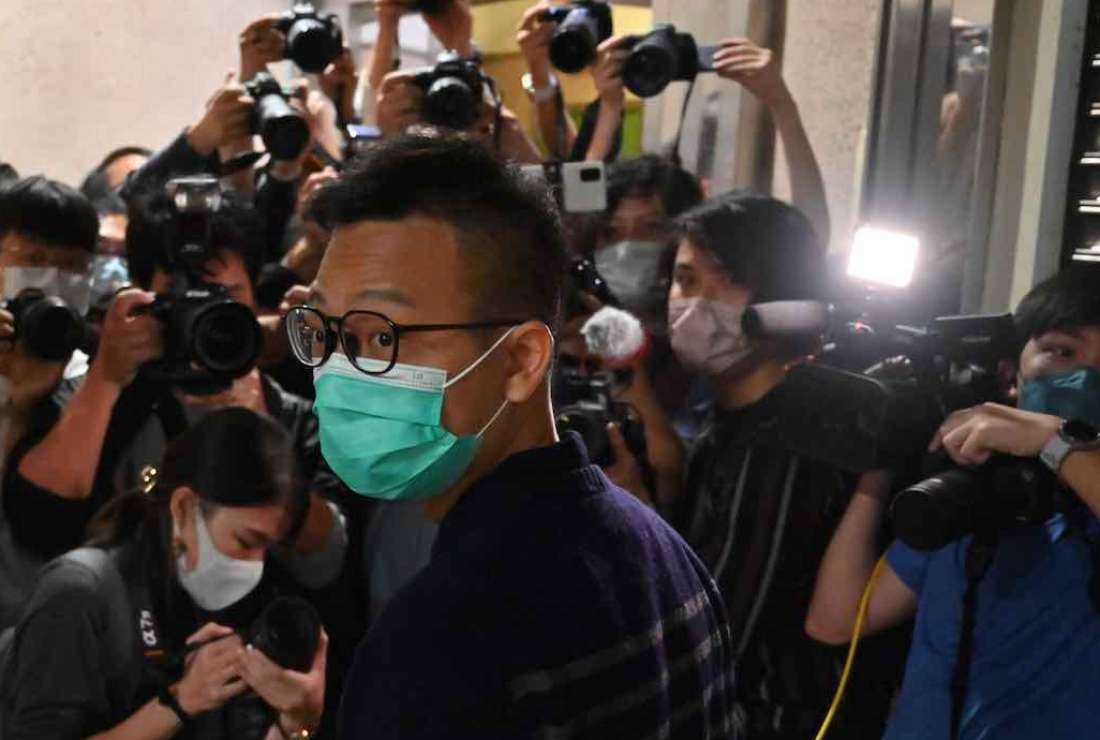 Patrick Lam, the former acting chief editor of defunct Hong Kong outlet Stand News, leaves the District Court after he was granted bail in Hong Kong on Nov. 7 after his lawyer applied for a permanent stay of the publication's sedition trial over improper handling of evidence
