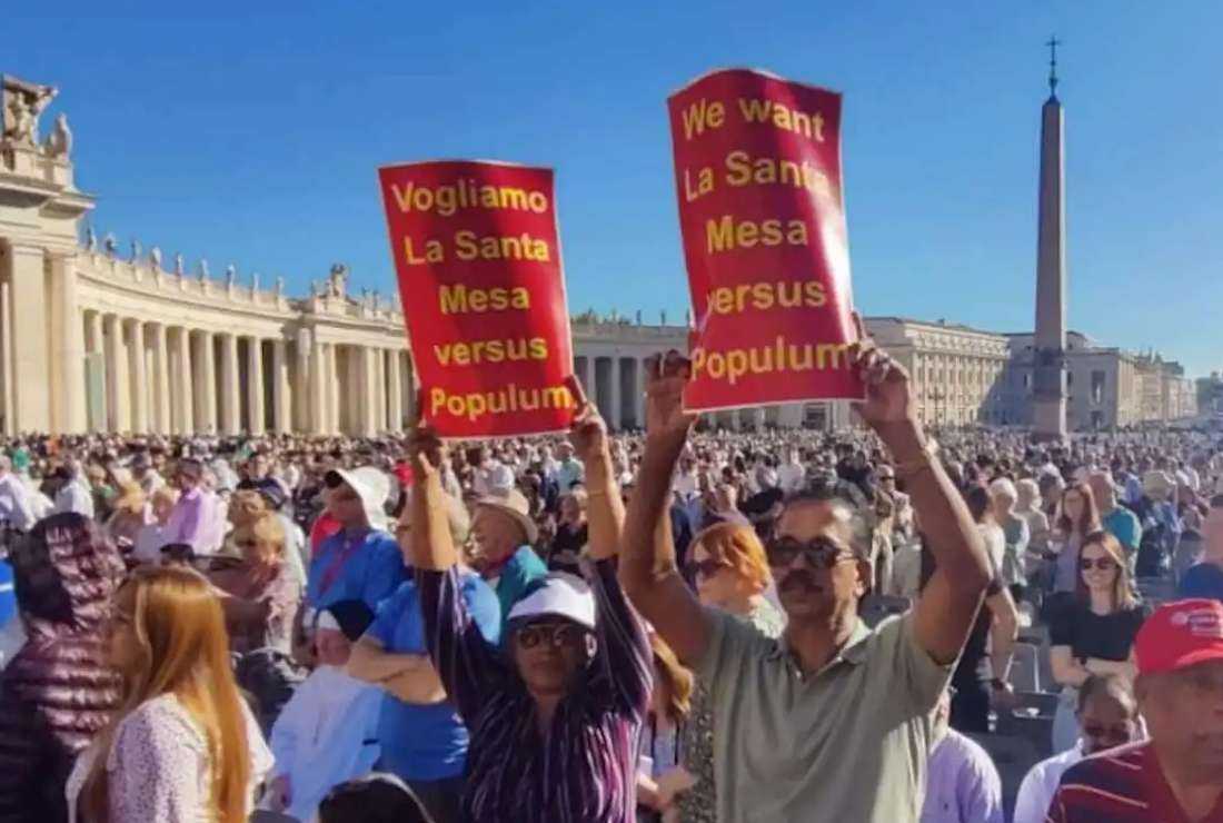 People from Eastern-rite Syro-Malabar Church, based in southern Kerala state in India, demonstrate with placards during the general audience of Pope Francis in the Vatican on Oct. 5 demanding to allow their priests to say Mass facing the people