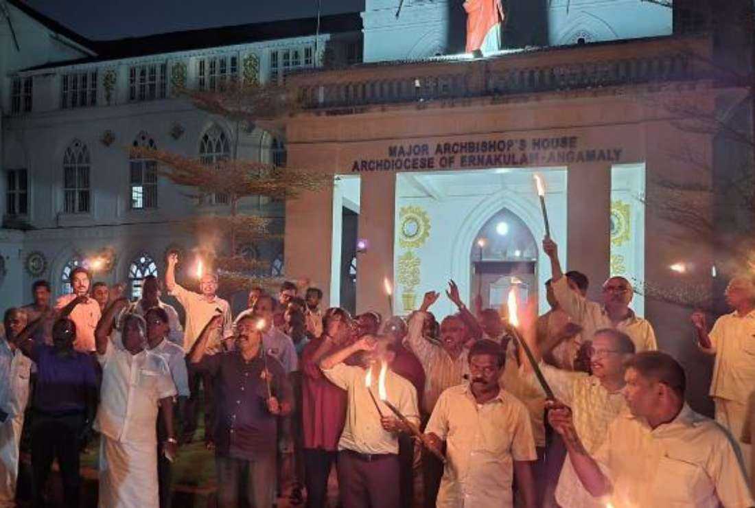Catholics stage a torchlight protest to demand resignation of Cardinal George Alencherry after a court ordered him to appear for a criminal trial in cases related to the sale of Church land in Ernakulam-Angamaly Archdiocese in southern Kerala state, India, on Nov. 9