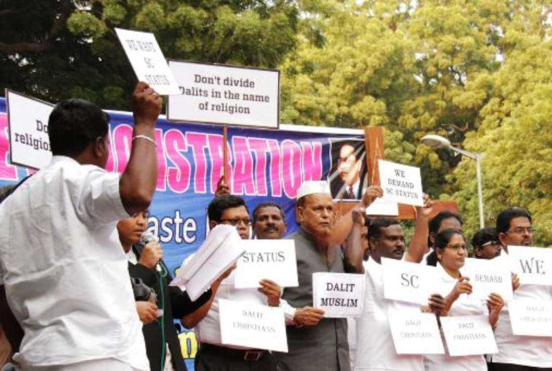 India's Dalit Christians and Muslims shout slogans at a protest to demand education and job quotas under the nation's reservation policy, in New Delhi on Dec. 4, 2018