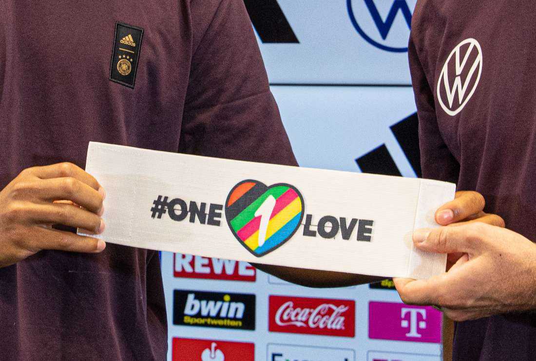 Germany's defender Thilo Kehrer (left) and Germany's midfielder Jonas Hofmann present the captain's armband, a symbol against discrimination and for diversity, on Sept. 21