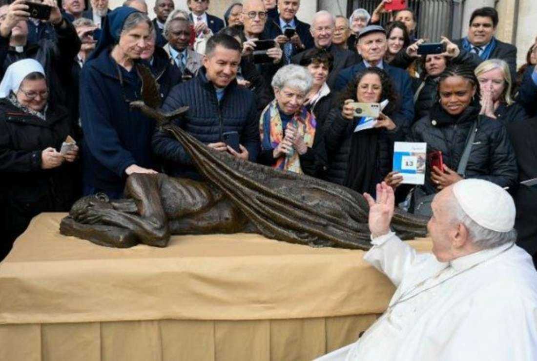 Pope Francis blesses Timothy Schmalz's 'Sheltering' statue during Wednesday General Audience
