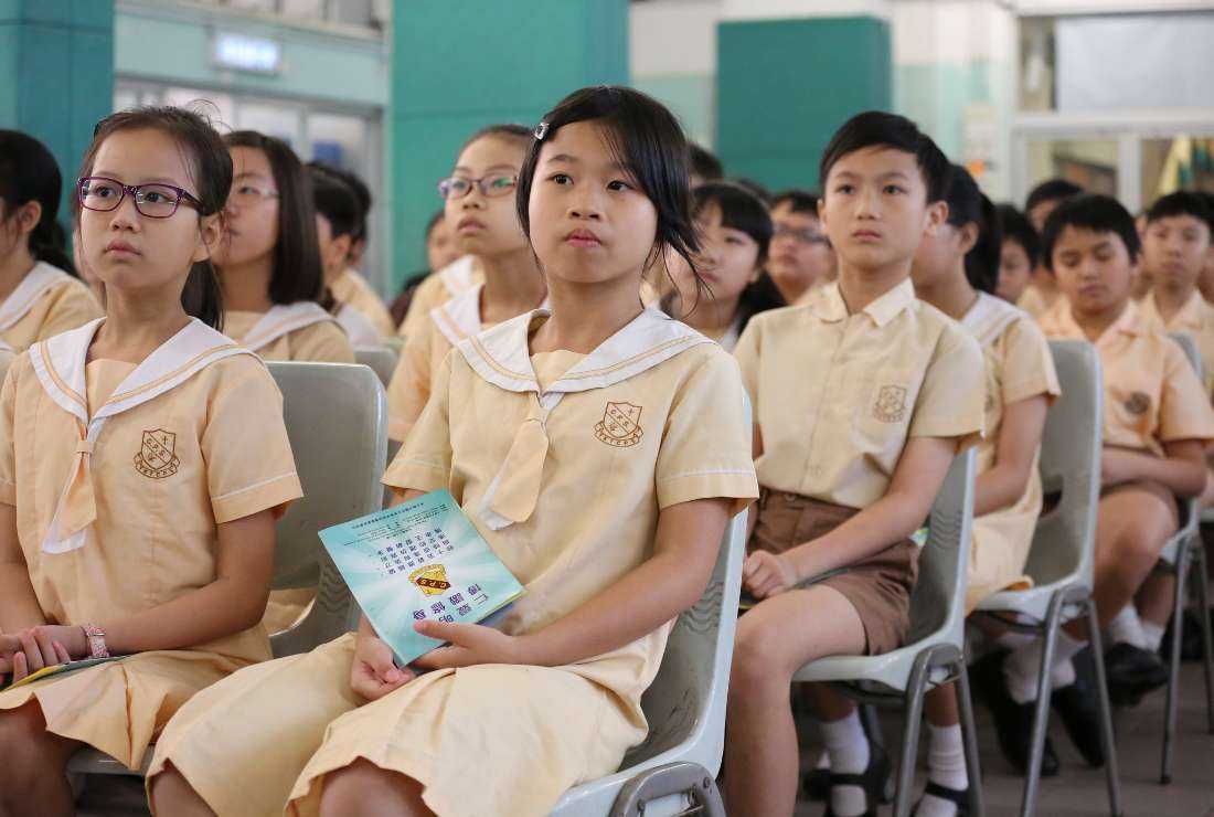 Students are seen at Tai Kok Tsui Catholic Primary School in Hong Kong in this file photo