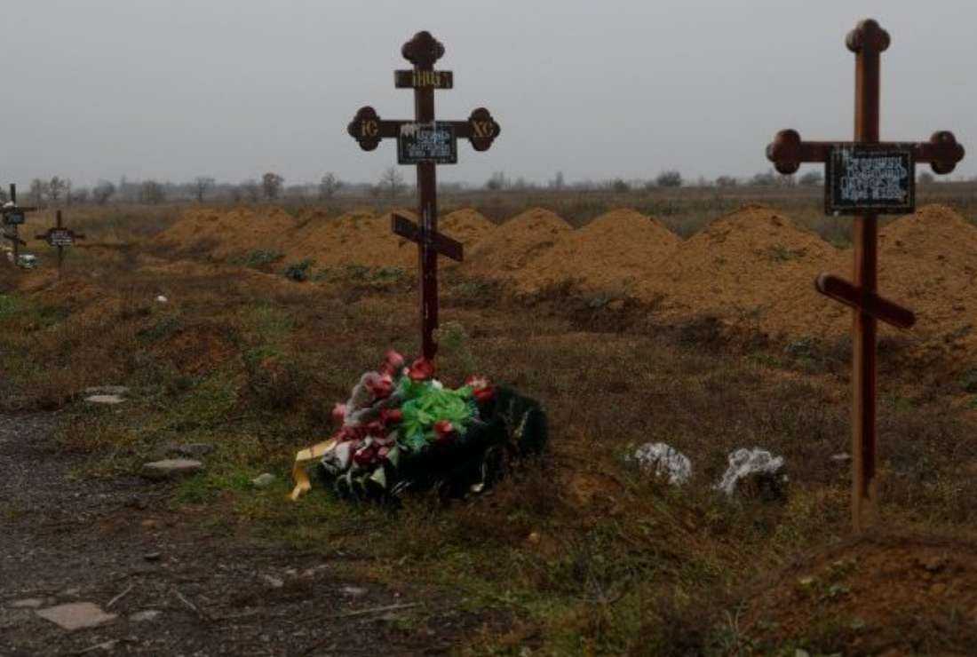 Graves of Ukrainian service member killed during the first day of Russian full scale invasion of Ukraine
