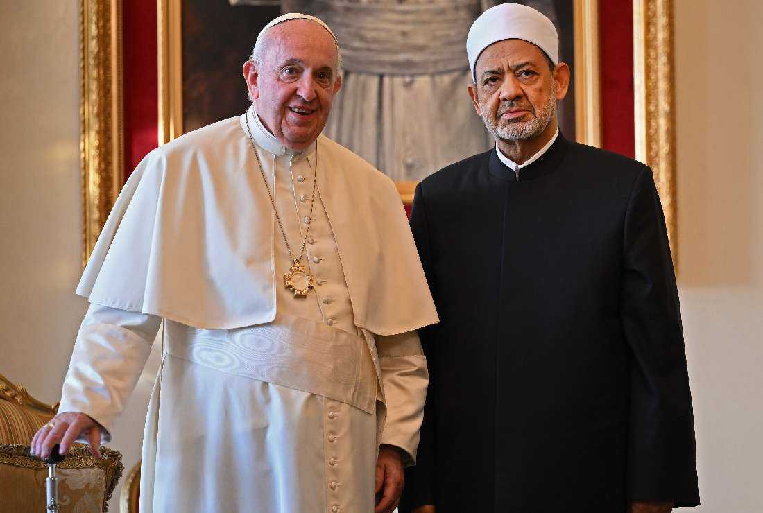 Pope Francis (left) poses for a picture with the Grand Imam of al-Azhar mosque Sheikh Ahmed Al-Tayeb during their meeting at the Papal residence near the Sakhir Royal Palace, in the eponymous Bahraini city on Nov. 4
