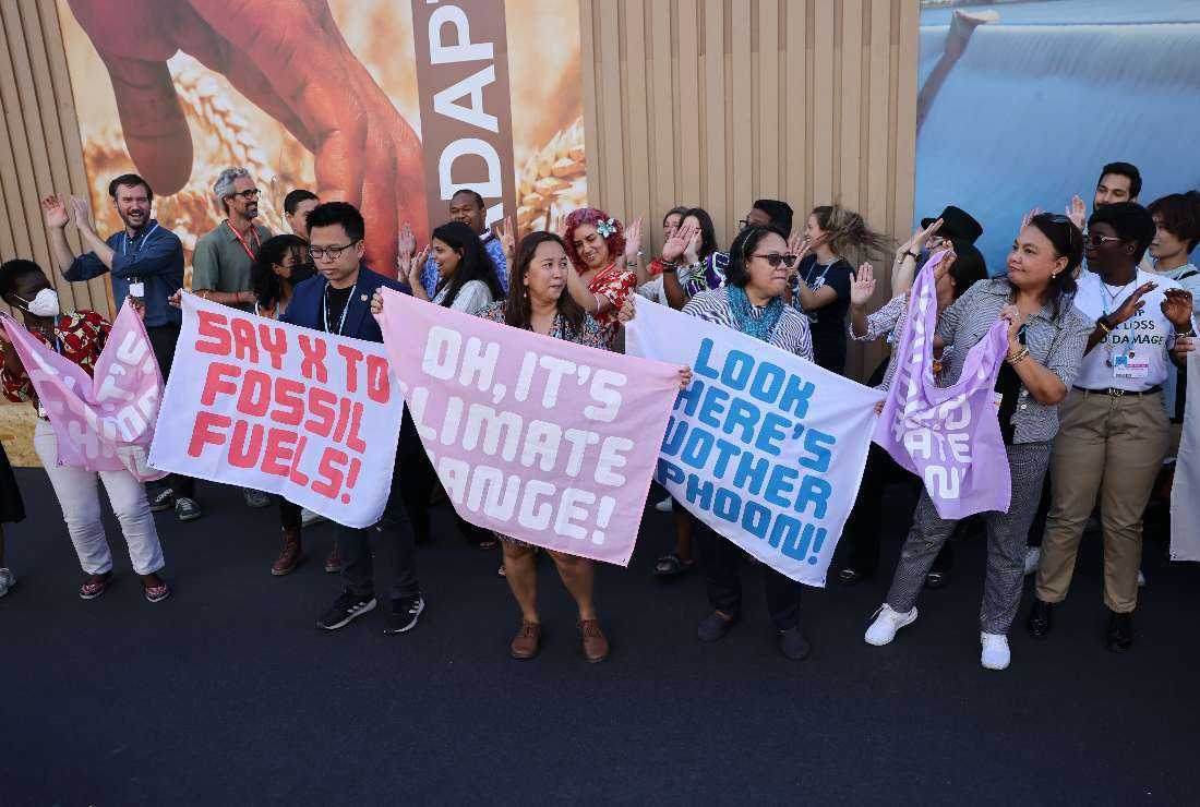 Climate activists demonstrate at the Sharm el-Sheikh International Convention Centre, in Egypt's Red Sea resort city of the same name, during the COP27 climate conference, on Nov