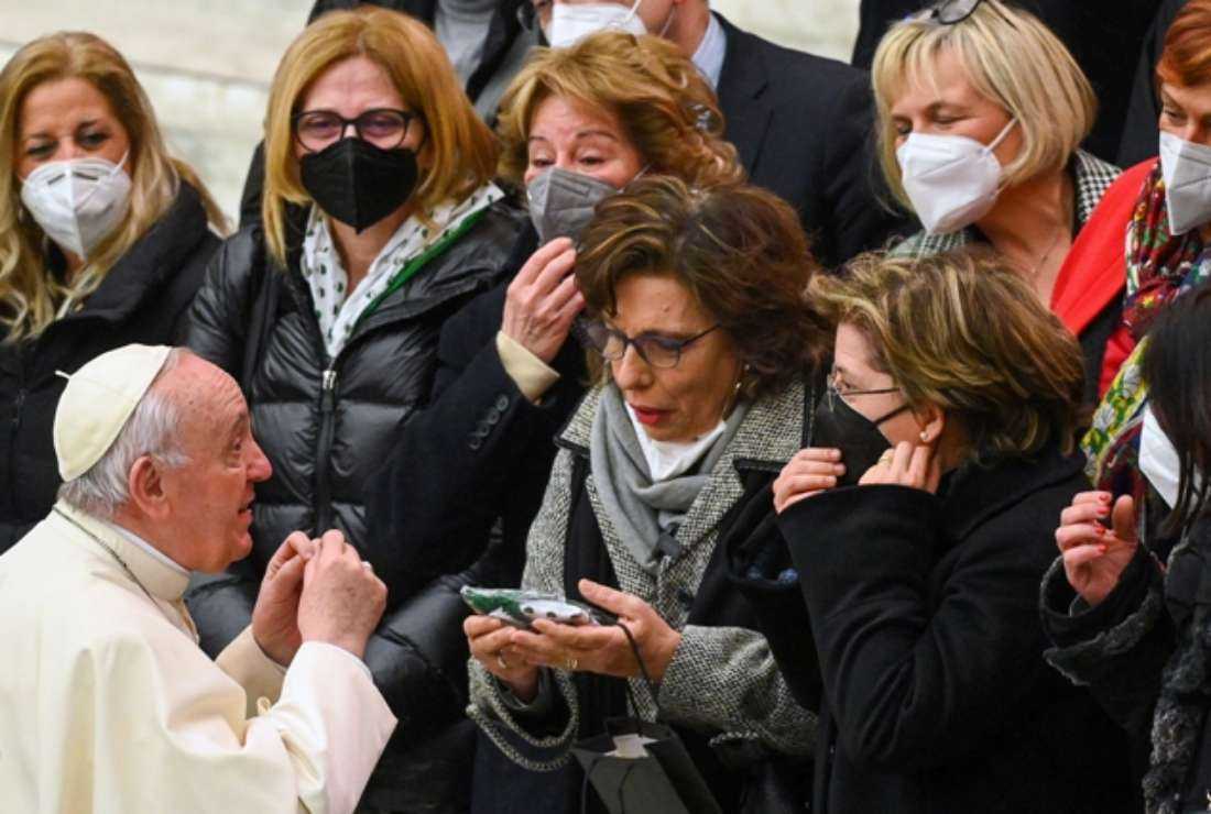Pope Francis meets a group of women at the end of his weekly general audience at the Paul VI hall in the Vatican on March 2
