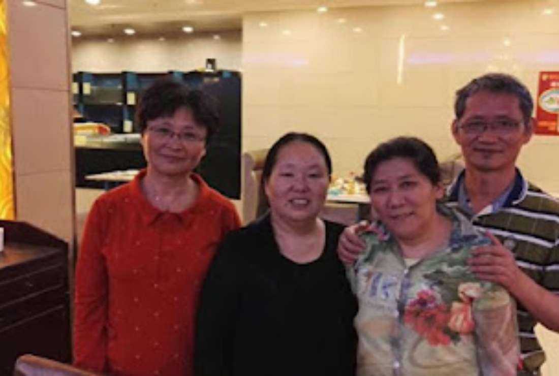 Shanghai-based housing rights activist, Chen Jianfang (second from left) is seen with her family members