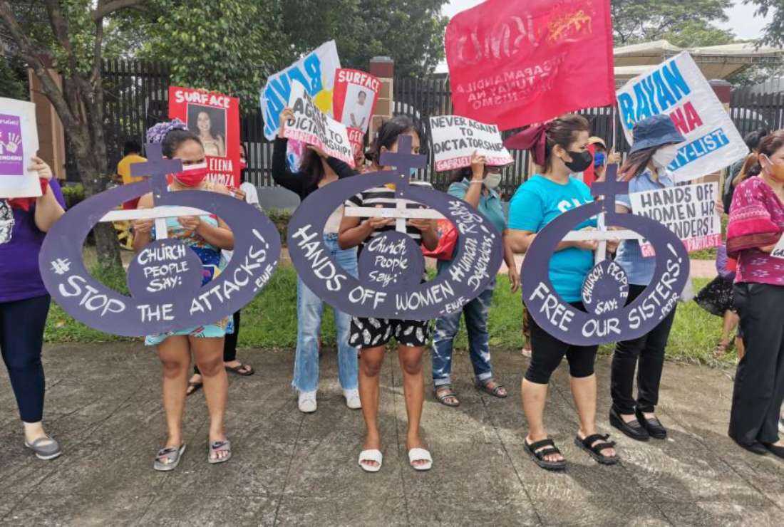 Filipino women join a rally to call for the end of domestic violence in the capital Manila