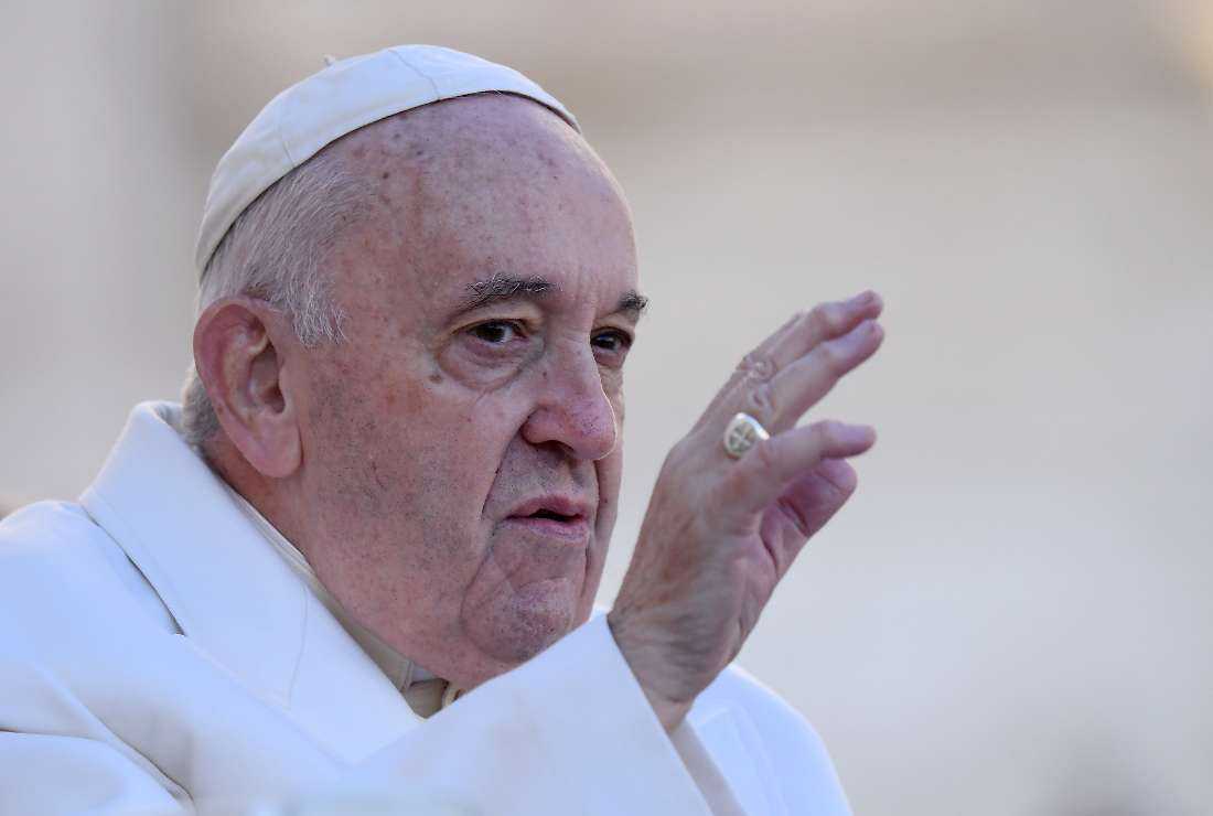 Pope Francis waves to pilgrims at the end of his weekly general audience in St.Peter's Square at the Vatican on Nov. 23