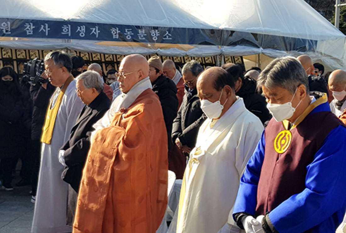 Leaders of various religious groups join a prayer for the victims of the Halloween stampede tragedy in the South Korean capital Seoul on Dec. 16