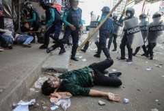 One killed as Bangladesh police fire on opposition rally