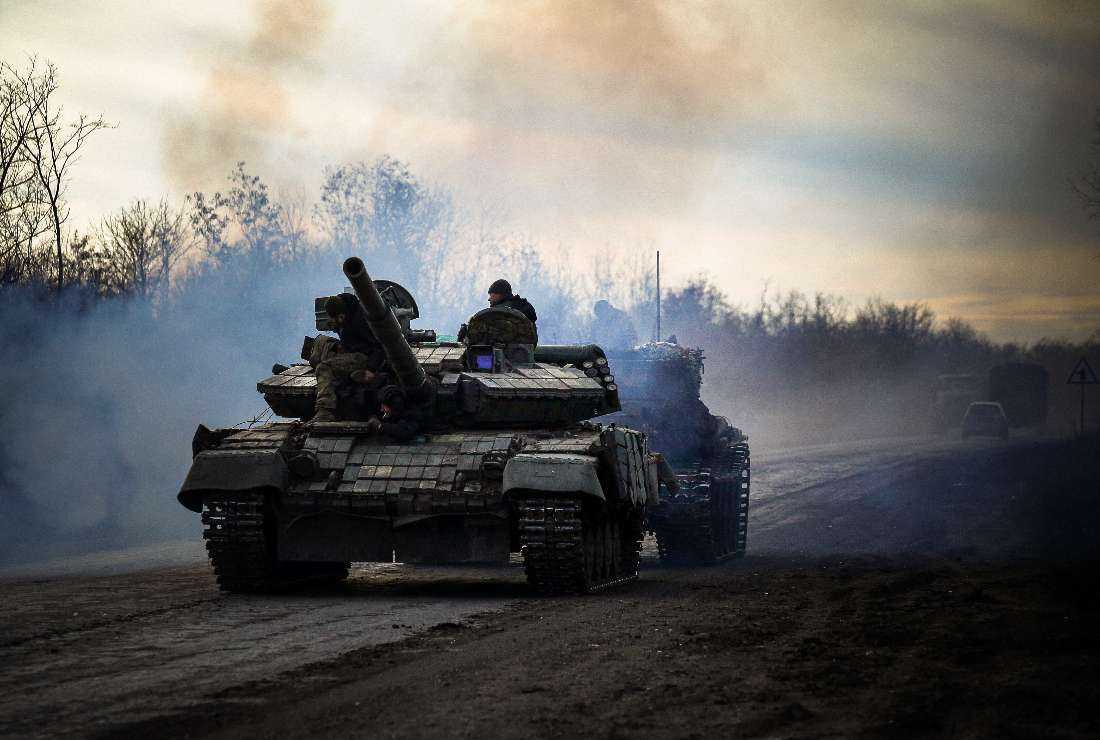 A Ukrainian tank rolls on a road near Bakhmut, in the Donetsk region, amid the Russian invasion of Ukraine, on Nov. 30