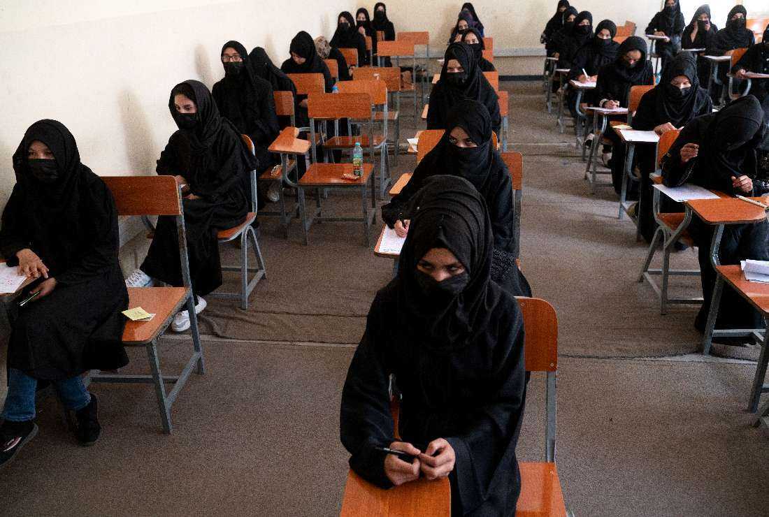 Afghan female students take an entrance exam at Kabul University in Kabul on Oct. 13