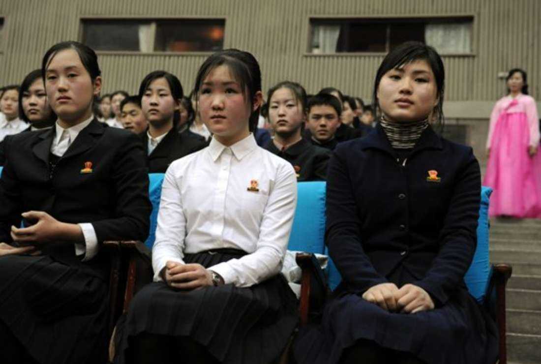 North Korean teenagers watch a performance at the Children's Palace along with members of the New York Philharmonic orchestra in Pyongyang on Feb. 27, 2008. The isolated Stalinist state hosted the New York Philharmonic for a landmark concert on February 26 and took the musicians and journalists on a rare city tour of the orderly capital