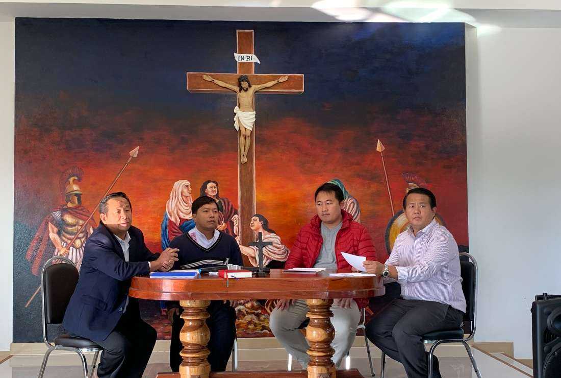 Hmong Catholics are seen inside a chapel of the church-run International Hmong Center in Chiang Mai, Thailand
