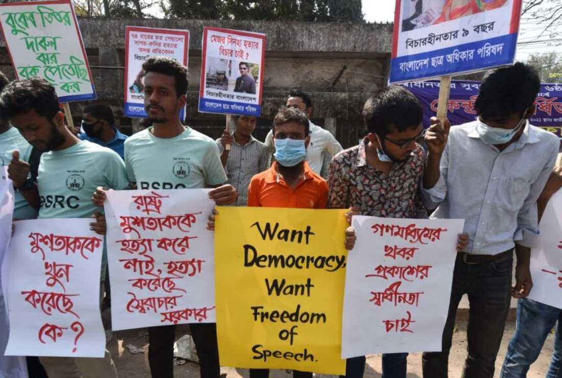 Activists hold placards during a demonstration demanding the repeal of the repressive Digital Security Act, in Bangladesh's captial Dhaka, on Feb. 27, 2021