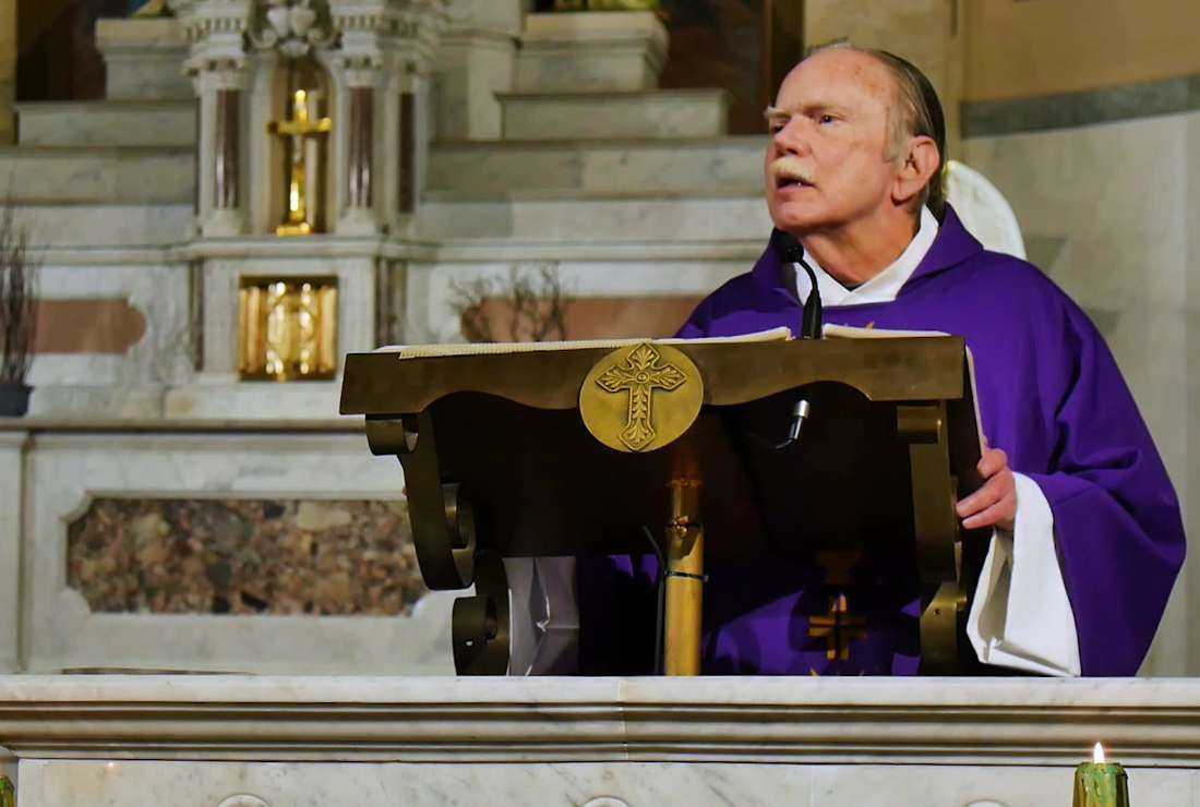 Father James T. Beighlie is seen delivering a homily on April 5, 2020, during Palm Sunday celebrations at St. Vincent DePaul Parish in the Archdiocese of St. Louis, Missouri