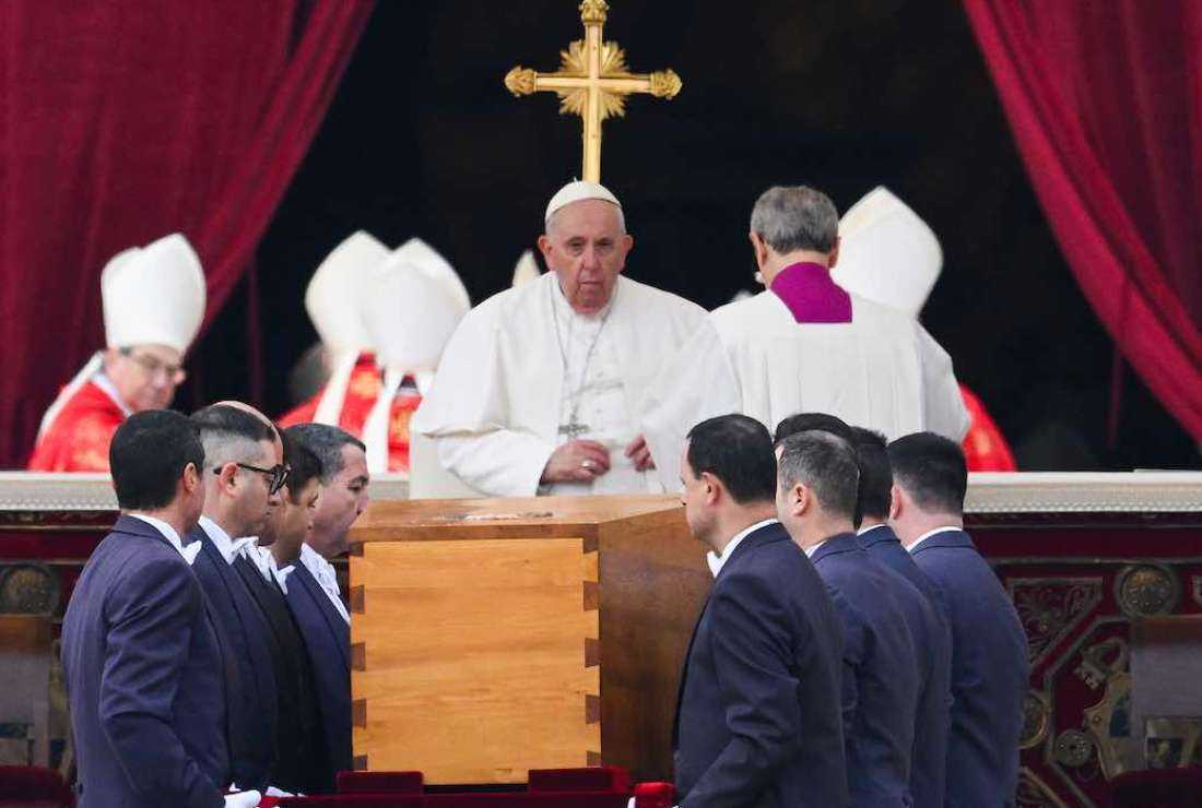 Pope Pope Francis looks on as pallbearers carry away the coffin of Pope Emeritus Benedict XVI at the end of his funeral mass at St. Peter's square in the Vatican on January 5, 2023