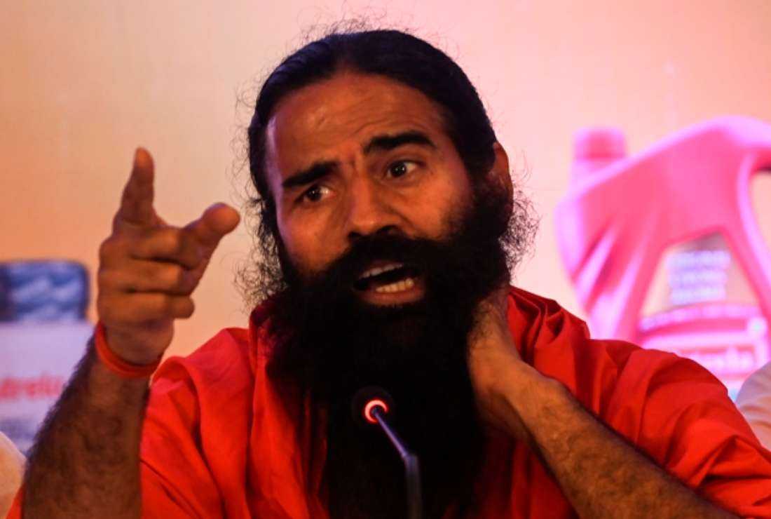 Indian yoga guru Baba Ramdev speaks during an event in Mumbai on March 21, 2022