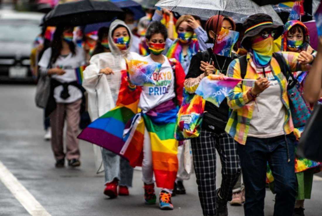 People attend the Tokyo Rainbow Pride 2022 Parade in Tokyo on April 24, 2022, to show support for members of the LGBT community