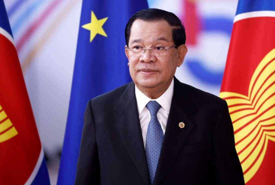 In this file photo taken on Dec. 14, 2022, Cambodia's Prime Minister Hun Sen arrives to attend the EU-ASEAN summit at the European Council headquarters in Brussels. Cambodia's strongman leader ordered the shutdown of one of the country's few remaining local independent media outlets on Feb. 12 after taking issue with a news report about his son