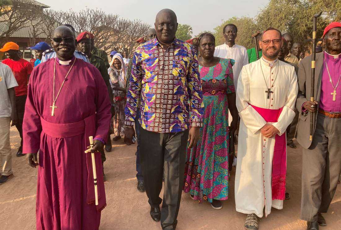 Catholic Bishop Christian Carlassare of Rumbek in central South Sudan, (right) is joined by Anglican Bishop Alapayo Manyang Kuctiel of Rumbek, (left)  and Rin Tueny, the governor of Lakes State, (center) at the launch of his 'Walking for Peace' pilgrimage