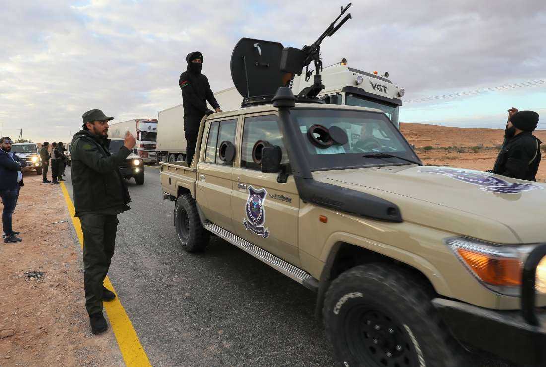 Libyan special forces in charge of illegal migration assemble in the southern region of Bani Walid, on Jan. 14 ahead of their mission as part of a security plan to enforce inspections at points of entry through the desert borders