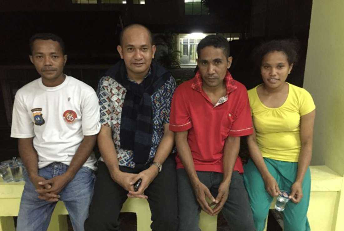 Indonesian Catholic priest Father Chrisanctus Paschalis Saturnus (second from left) is seen with undocumented migrant workers from East Nusa Tenggara province in this 2016 file image