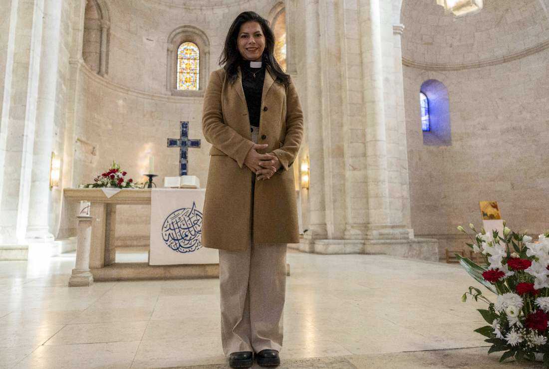 Sally Ibrahim Azar, first female pastor in the Holy Land of the Lutheran Church, poses for a picture at the Lutheran Church in the Jerusalem's Old City, on Jan. 25
