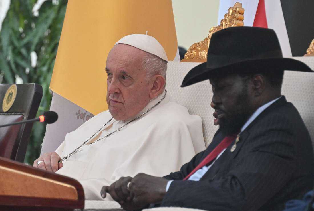 Pope Francis (left) and the President of South Sudan Salva Kiir attend a meeting with authorities, leaders of civil society, and the diplomatic corps, in the garden of the Presidential Palace in Juba, South Sudan, on Feb. 3