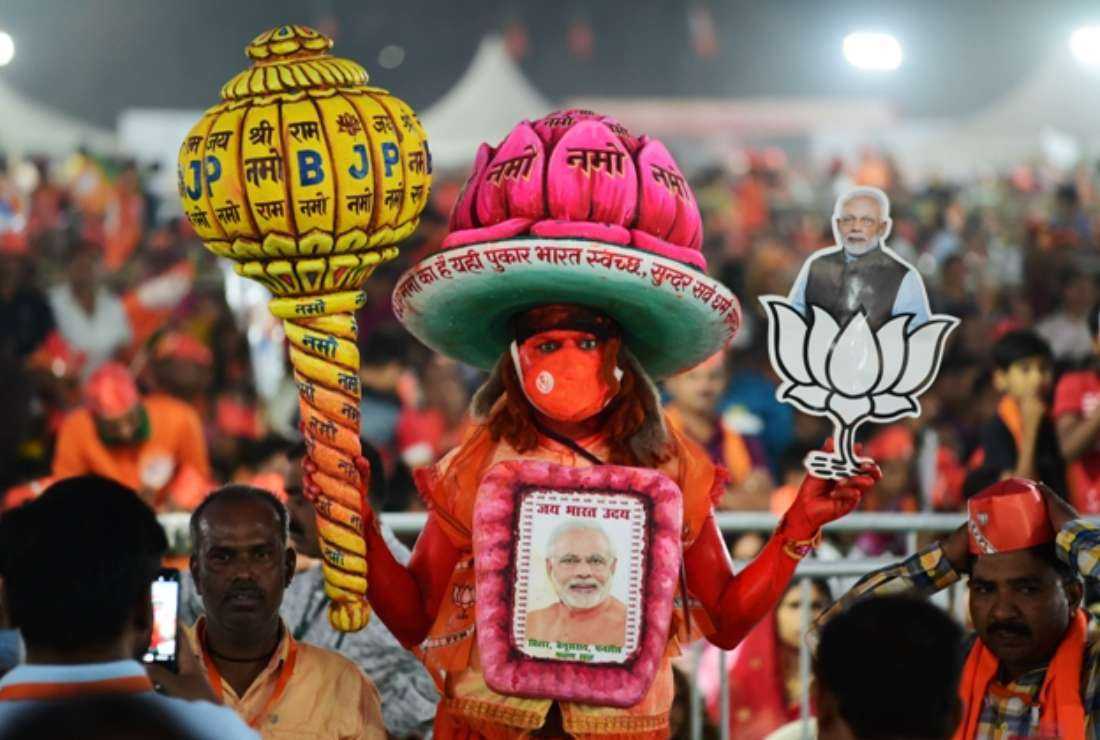 A supporter of India's ruling Bhartiya Janta Party attends a rally addressed by Prime Minister Narendra Modi ahead of Gujarat's assembly election, in Ahmedabad on Dec. 2, 2022
