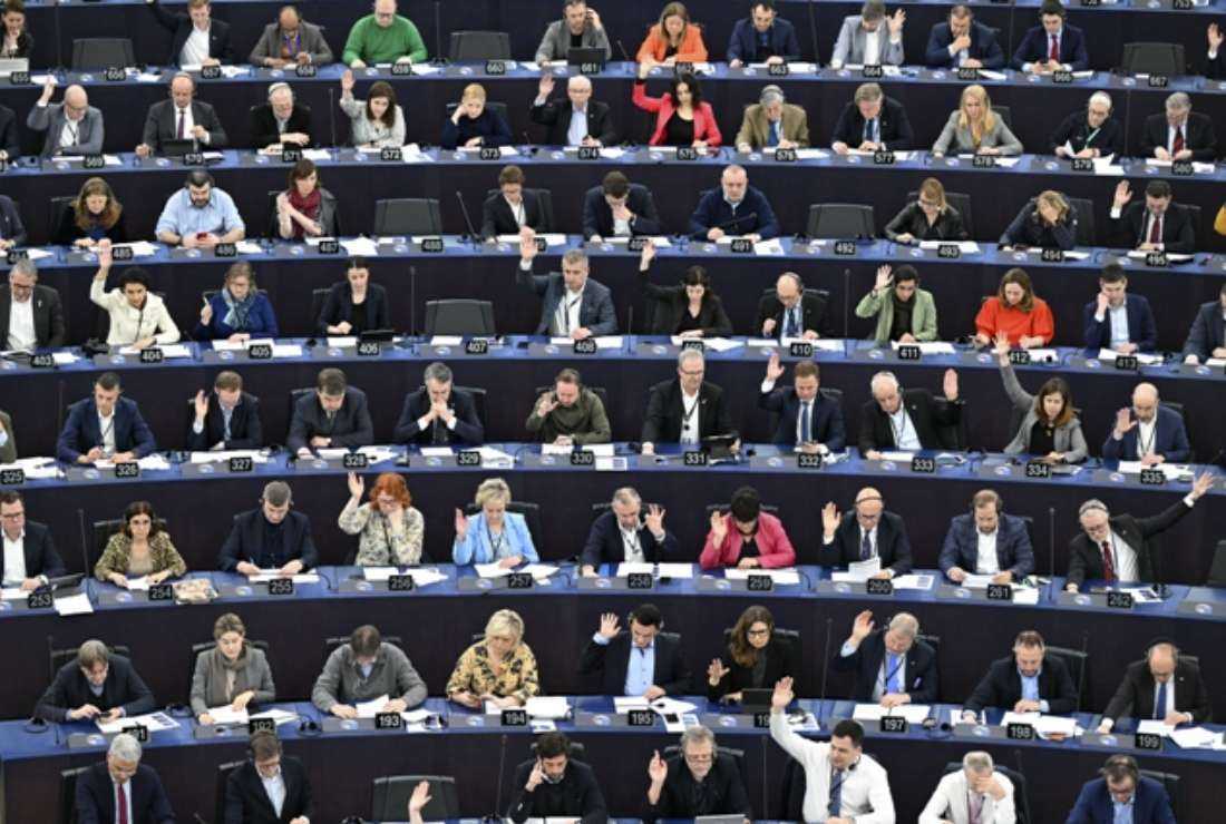 Members of the European Parliament take part in a voting session during a plenary session in Strasbourg, eastern France, on March 14