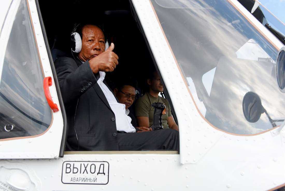 Cambodia's Defence Minister Tea Banh gives a thumbs up from inside a Russian Mil Mi-171A2 helicopter during an airshow at a military airbase in Phnom Penh on Nov. 20, 2018