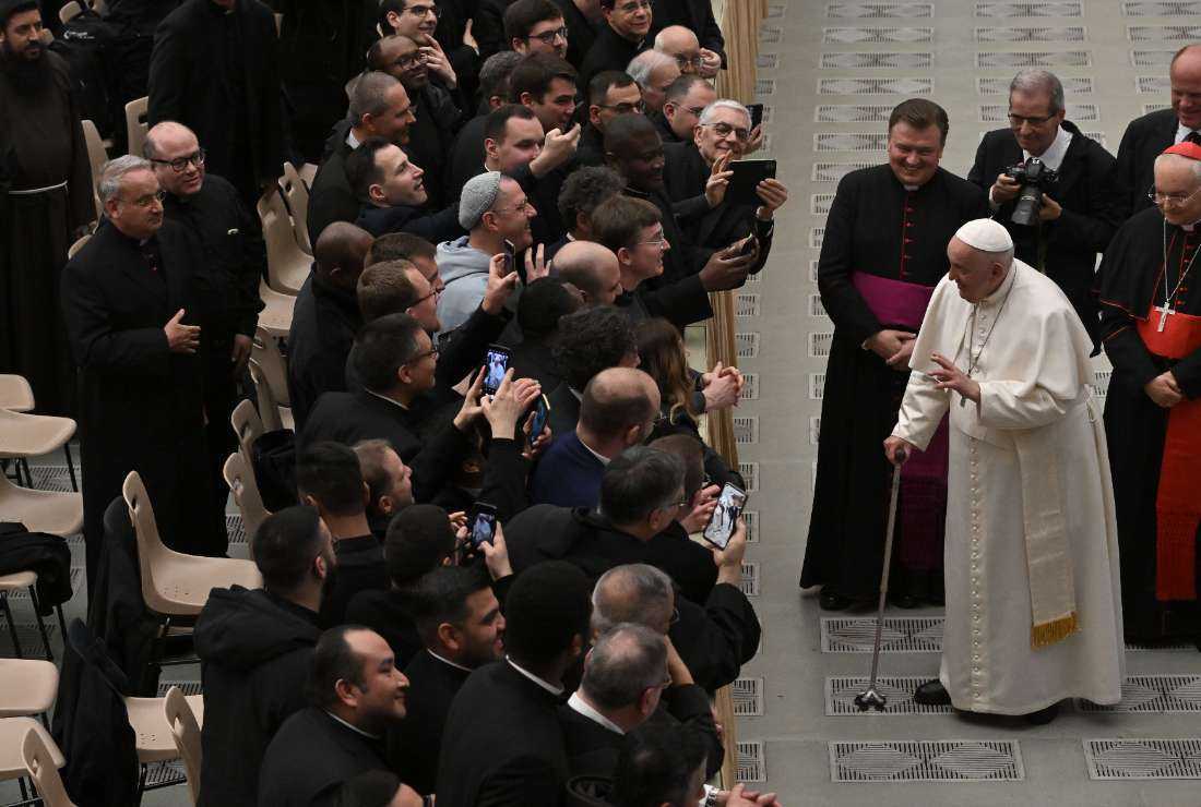 Pope Francis (right) meets with attendees during an audience to participants in the Course on the Internal Forum organized by the Tribunal of the Apostolic Penitentiary, on March 23 at Paul-VI hall in The Vatican
