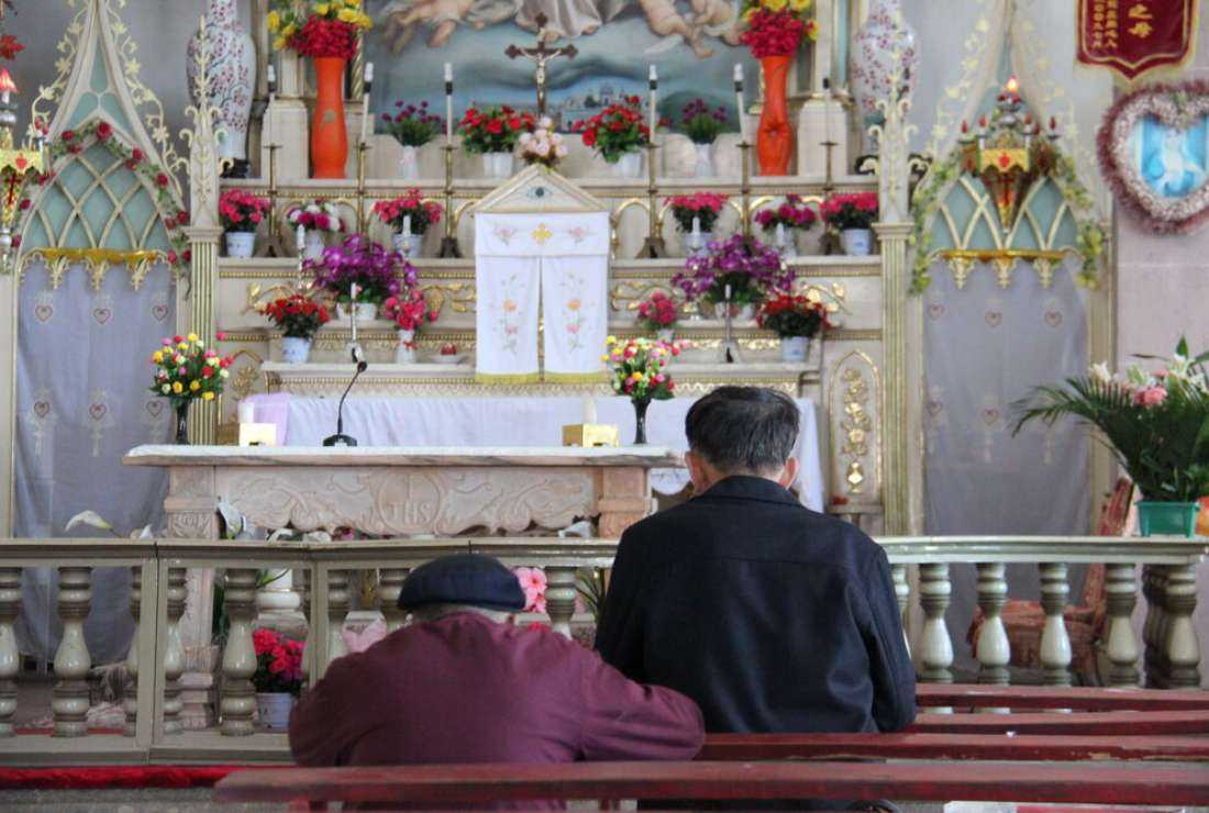 Christians pray inside a church in China in this file image