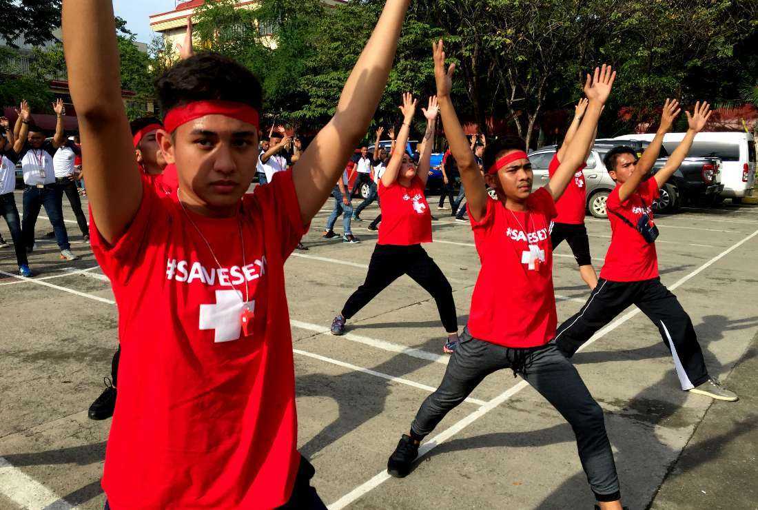 Filipino youths join a campaign to raise awareness about safe sex and HIV/AIDS