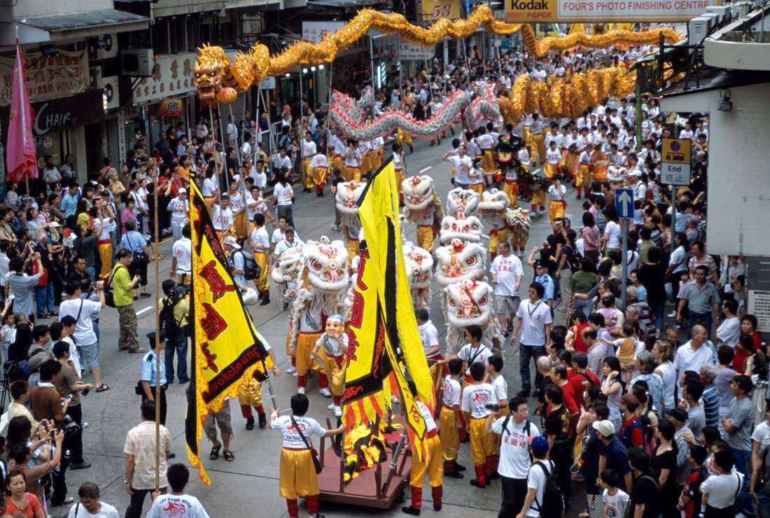 Hong Kong residents join a street rally to celebrate the birthday of Tam Kung, a folk Chinese legend revered by fisher folks and coastal communities in this file photo. The Taoist Association canceled a street parade following a police order