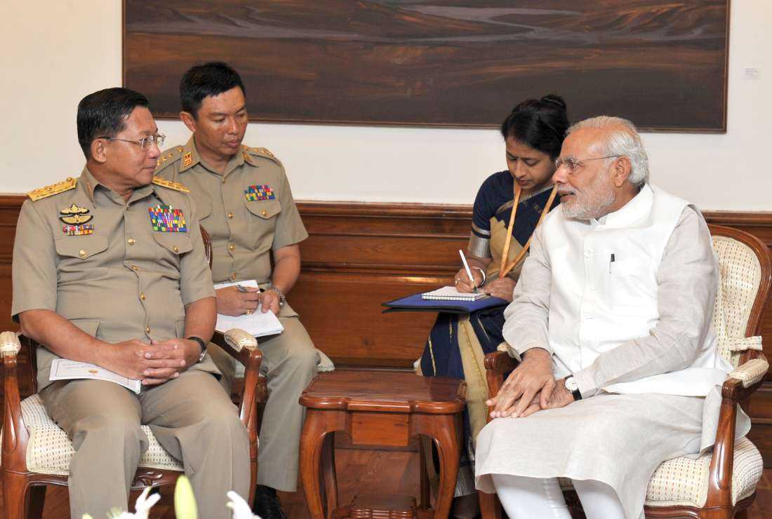 In this handout photograph taken and released by the Indian Press Information Bureau (PIB) on July 29, 2015, Myanmar's Commander-in-Chief of Defence Services Senior General Min Aung Hlaing (left) speaks during a meeting with Indian Prime Minister Narendra Modi in New Delhi on July 29, 2015.