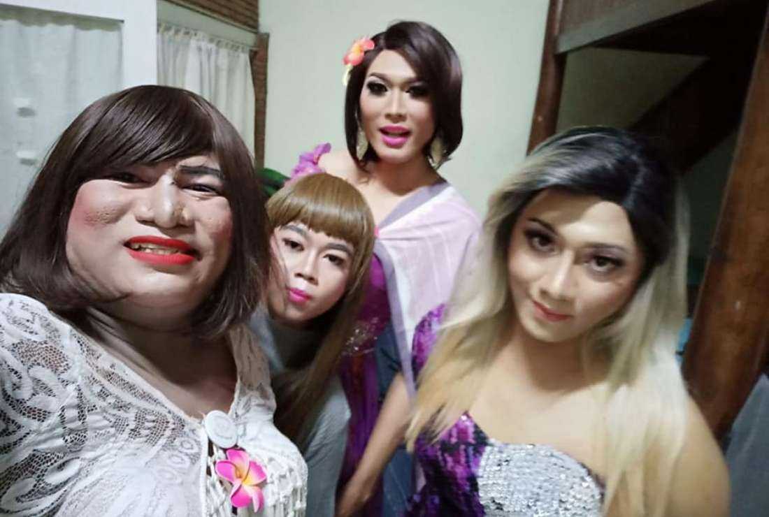 Hendrika Mayora Victoria (left), a 35-year-old Catholic transgender, posing for a photograph with her friends. Advocacy groups have asked the mass media not to give undue importance to politicians' efforts to use LGBT issues ahead of polls