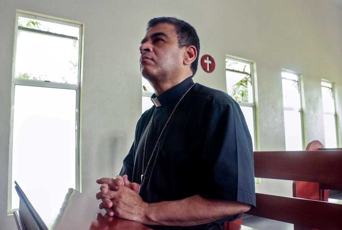 Nicaraguan Catholic bishop Rolando Alvarez prays at the Santo Cristo de Esquipulas church in Managua, on May 20, 2022