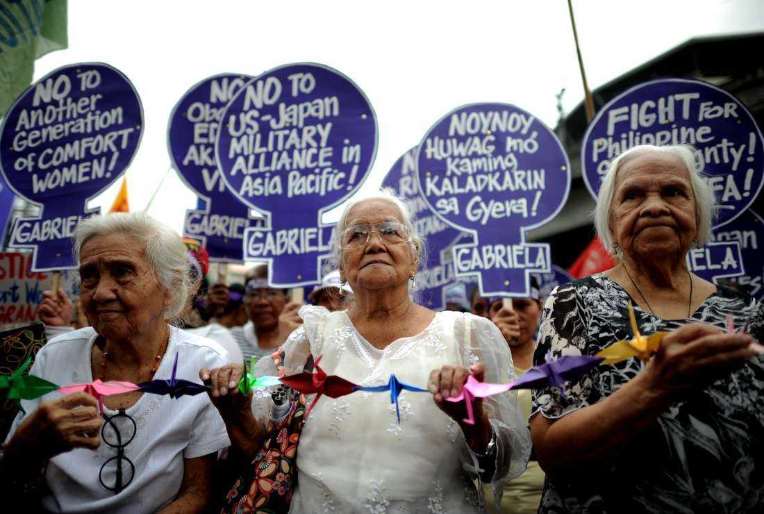 Filipina 'comfort women', sex slaves for the Japanese Imperial army during World War II, join in a protest near the Malacanang Palace in Manila where visiting Japanese Emperor Akihito is meeting the Philippine president on January 27, 2016