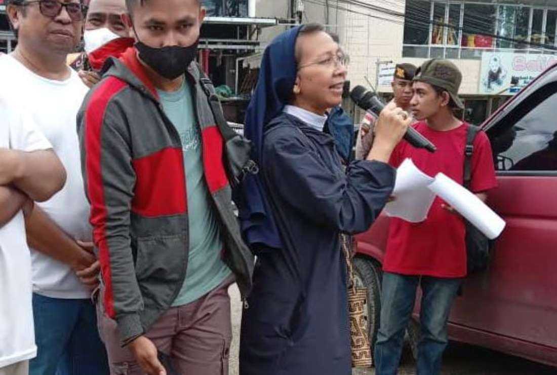 Sister Laurentina Suharsih from the Congregation of the Sisters of Divine Providence speaks during a protest march in Kupang, East Nusa Tenggara province, on March 6 in support of Father Chrisanctus Paschalis Saturnus