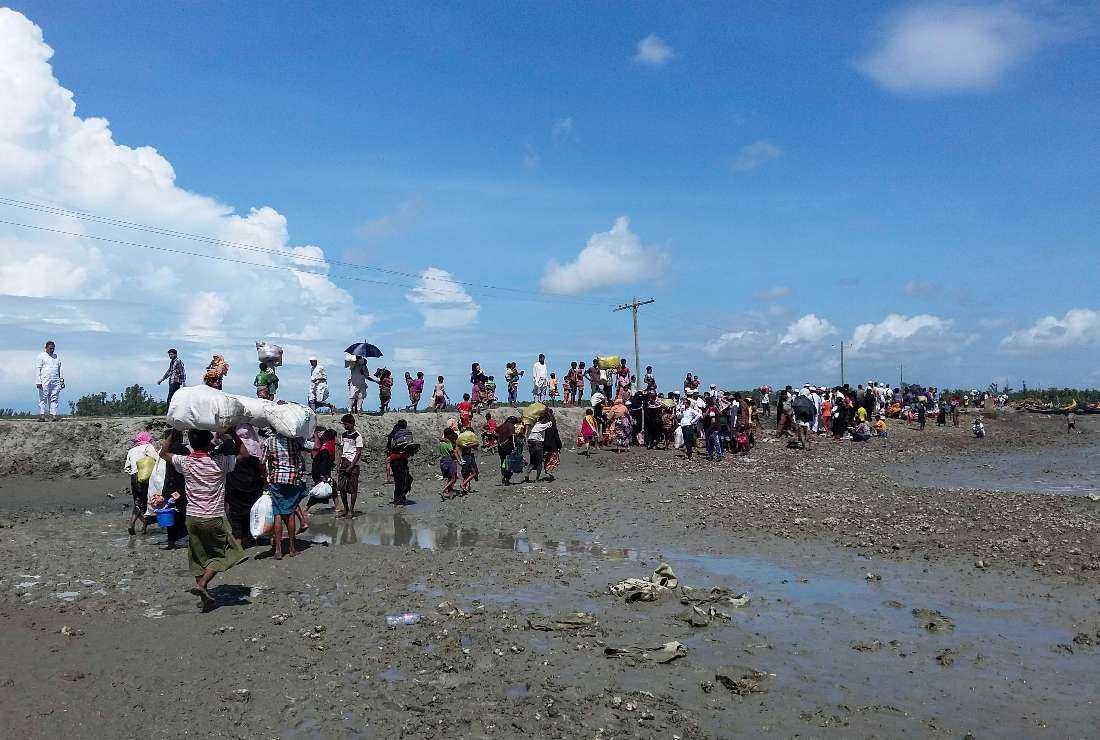 Rohingya Muslims enter Bangladesh following a military crackdown in Rakhine state of Myanmar in August 2017