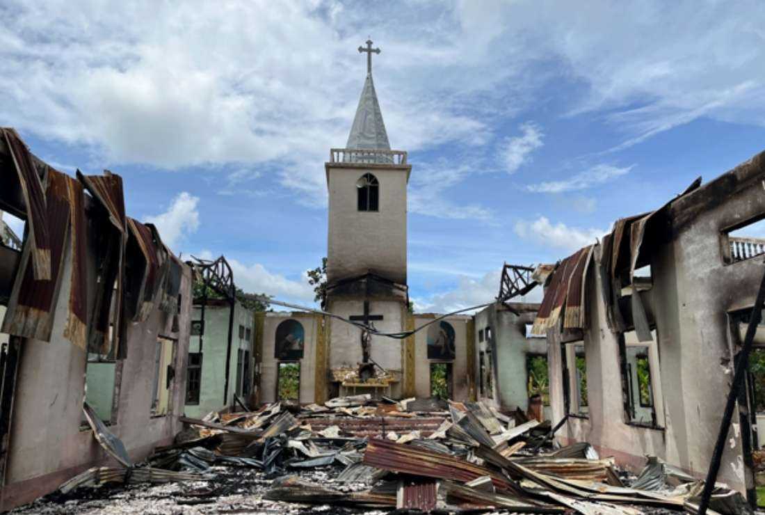 This handout photo from Amnesty International taken between June 27 and July 4, 2022, and released on July 20 shows a Christian church destroyed after being landmined and burned down by the Myanmar military, according to the rights group, in Daw Ngay Ku village in Hparuso township, in eastern Myanmar's Kayah state