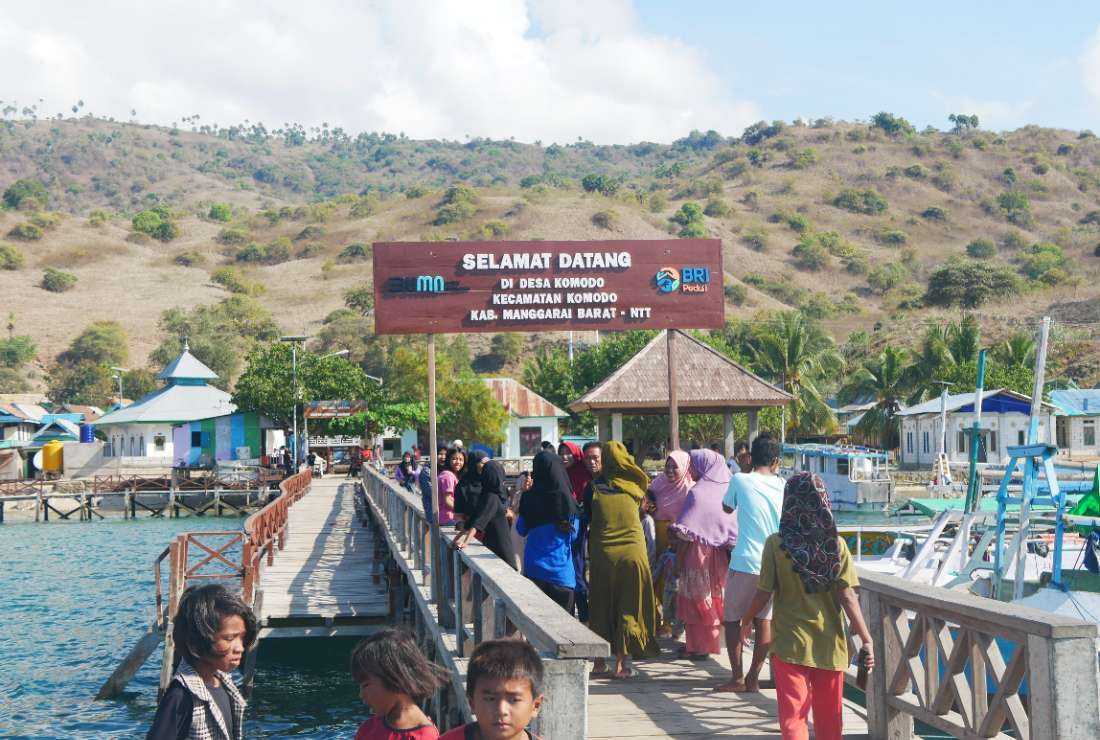 Visitors are seen at the entrance of Komodo National Park in Indonesia's East Nusa Tenggara province in 2022